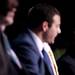 Michigan senior Eso Akunne looks at teammates on stage during the basketball banquet on Tuesday, April 16. AnnArbor.com I Daniel Brenner